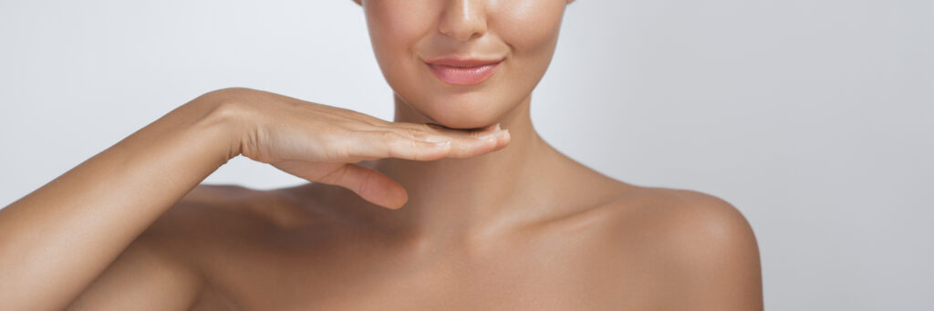 Woman with smooth skin considering Botox and dermal fillers treatment.